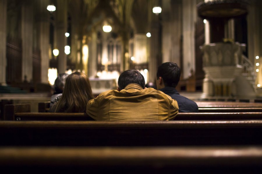 praying people at the church